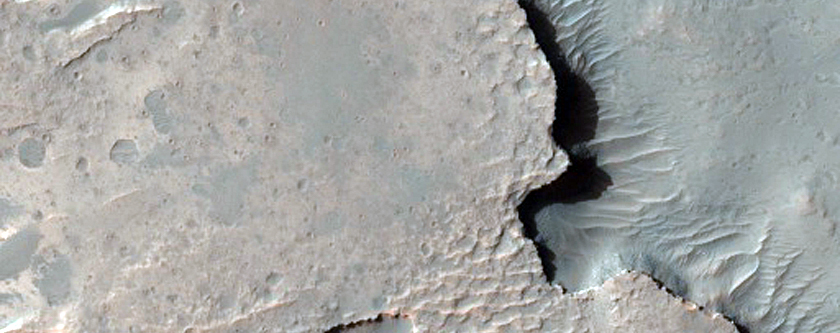 Light-Toned Mesa in Crater in CTX Image P17_007740_1554_XI_24S266W
