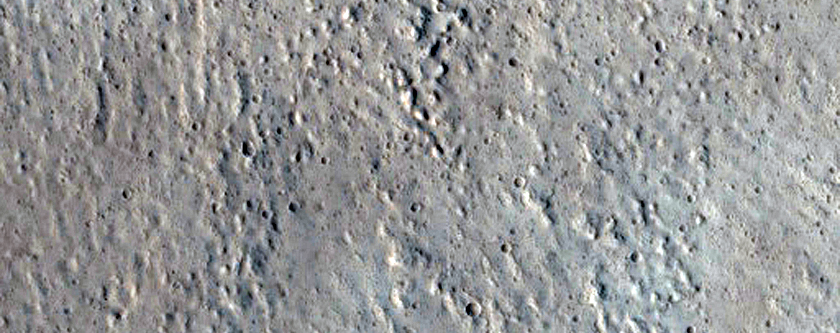 Layering in Crater Wall Near Tractus Fossae
