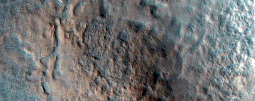 Possible Bedrock Exposure in Large Crater
