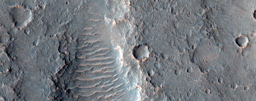 Crater and Elevated Troughs in THEMIS Image V27135001
