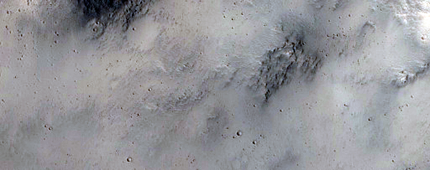 Exposed Layers in Crater in Phlegra Montes
