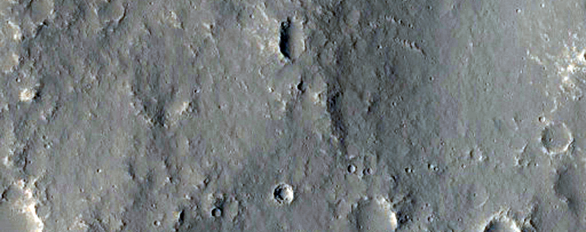 Craters Intersected by Mare-Type Ridges in Lunae Planum
