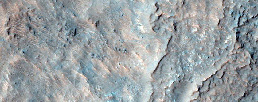 Layered and Mantled Crater Wall North of the Hellas Region