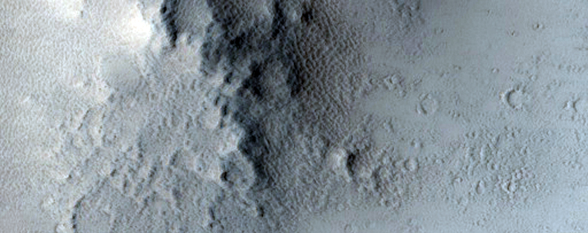 Central Peak and Ejecta of 7-Kilometer Crater in Daedalia Planum
