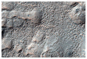 Channel Cutting Crater Wall in Nereidum Montes