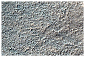 Crater and Fan-Shaped Feature in Terra Sirenum