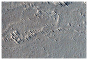 Flows and Small Volcanoes on Flanks of Ascraeus Mons