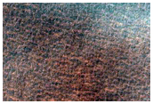 Dark Filamentary Streak in Promethei Terra