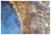 Impact Crater on Apex of Wrinkle Ridge