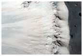 Steep Crater Slope with Bright Flows