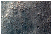 Light-Toned Material on Crater Rim