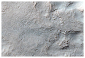 Crater Ejecta Blanket and Relation to Underlying Topographic Features