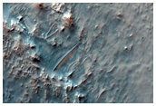Well-Preserved Large Crater with Central Peak and Pit