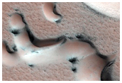 Defrosting of Dunes with Large Gullies