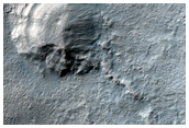 Layered Deposit along Reull Vallis