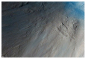 Ejecta and Rays Associated with Crater in Isidis Planitia