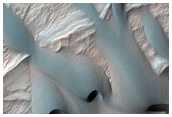 Intracrater Dunes Superposed on Ridges on Fan Surface