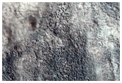 Small Low Albedo Crater in Acidalia Planitia
