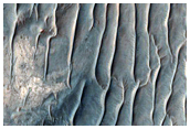 Faults in Ius Chasma