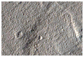 Small Volcano in Plains North of Ascraeus Mons