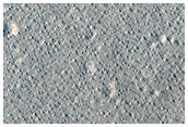 Pits and Channels Southwest of Tooting Crater Near Ejecta