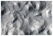 Impact Crater with Rocky Walls and Central Structure in Elysium Planitia