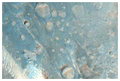 Dark Central Uplift in an Unnamed Crater in Hesperia Planum