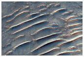 Possible Sulfates or Zeolites in a Crater in Libya Montes