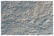 Strange Features in Hellas Basin