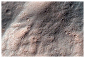 Possible Rock Exposures in Crater Wall