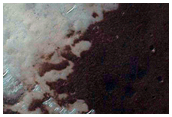 Impact Crater with Central Pit on Floor of Larger Crater