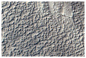 Stratified Material in Pit as Seen in CTX Image 