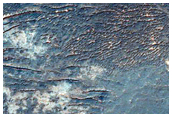 Light-Toned Layering along Plains South of Melas Region
