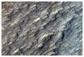 Dusty Lava Flows on the Flanks of Olympus Mons