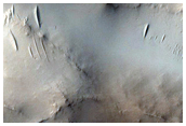 Small Impact into Layered Ejecta in Arabia Terra