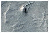 Pit in Memnonia Sulci