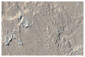 Flow Draped over Crater Rim Visible in CTX Image 