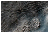Terraces or Strata on Slope in Crater near Southeast Hellas Region