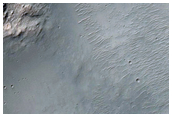 Bedrock Exposed by 8-Kilometer Crater in Hesperia Planum