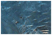 Central Structure of an Impact Crater
