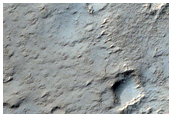 Pits on Mangala Valles Floor