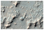 Eroded Bedrock Layers on Crater Floor