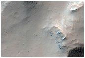 Cut Crater on Capri Chasma Rim