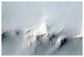 Layers in Interior of Cassini Crater