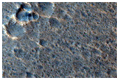 Edge of Streamlined Form Associated with Crater