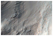 Well-Preserved Impact Crater on Floor of Coprates Chasma