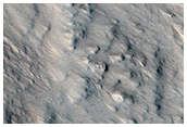 Western Portion of Well-Preserved 15-Kilometer Crater Near Alba Mons