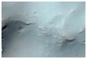 Impact with Mound Intersected with Larger Crater Rim