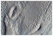 Pits and Cracks on Crater Floor in Protonilus Mensae
