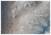 Eastern Rim of Well-Preserved 15-Kilometer Crater Near Alba Mons